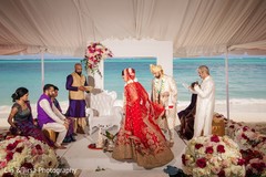 Indian couple walking inside the Indian altar. Indian couple walking inside the Indian altar.