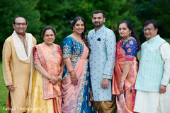 Indian couple with their parents in Sangeet picture. Indian couple with their parents in Sangeet picture.