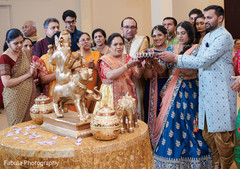Maharani and Indian relatives giving offerings to their Indian deity. Maharani and Indian relatives giving offerings to their Indian deity.