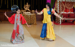 Indian bridesmaids dancing in reception party. Indian bridesmaids dancing in reception party.