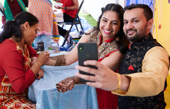 indian relative taking a selphie with Maharani. indian relative taking a selphie with Maharani.