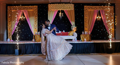 Indian bride dancing with her Indian groom. Indian bride dancing with her Indian groom.