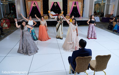 Maharani and bridesmaids performing for Indian groom. Maharani and bridesmaids performing for Indian groom.