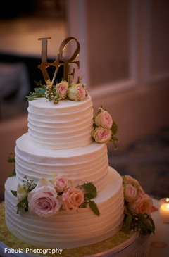 Indian wedding cake decorated with roses. Indian wedding cake decorated with roses.