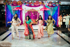 Indian bridesmaids performing a choreography. Indian bridesmaids performing a choreography.