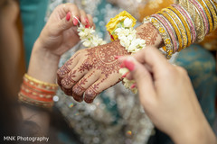 Maharani getting her flowers brazalete for the haldi rituals. Maharani getting her flowers brazalete for the haldi rituals.