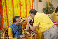 Indian relatives blessing bride at her haldi rituals. Indian relatives blessing bride at her haldi rituals.