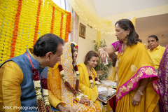 Indian relatives during the manjha rituals. Indian relatives during the manjha rituals.