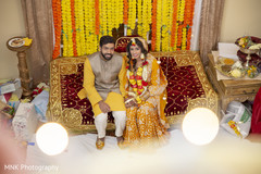Indian couple posing on their haldi outfits. Indian couple posing on their haldi outfits.