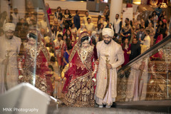 Indian couple leaving from wedding ceremony. Indian couple leaving from wedding ceremony.