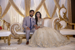 Indian couple posing at reception stage. Indian couple posing at reception stage.