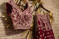 Red and golden decorations on maharanis wedding lehenga. Red and golden decorations on maharanis wedding lehenga.