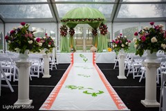 Indian chinese green mandap and white wedding ceremony aisle. Indian chinese green mandap and white wedding ceremony aisle.