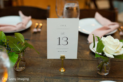 Indian wedding reception white and gold table number. Indian wedding reception white and gold table number.