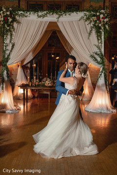 Indian couple dancing at reception photography. Indian couple dancing at reception photography.
