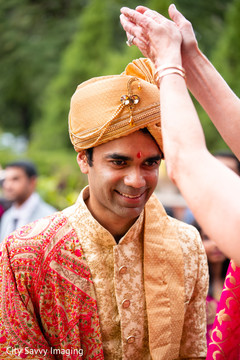 Elegant Indian groom on his golden ceremony outfit. Elegant Indian groom on his golden ceremony outfit.