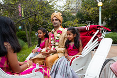 Indian groom with flower girls on charriage. Indian groom with flower girls on charriage.