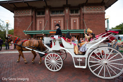 Indian groom on his white carriage pulled by a horse. Indian groom on his white carriage pulled by a horse.