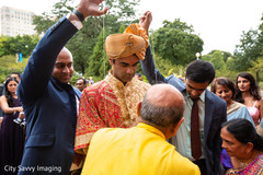Indian groom getting thread all over at pre-wedding rituals. Indian groom getting thread all over at pre-wedding rituals.