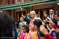 Indian groom with relatives dancing at baraat. Indian groom with relatives dancing at baraat.