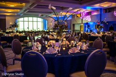 Indian chinese wedding reception blue lights and table decor. Indian chinese wedding reception blue lights and table decor.