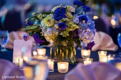 Indian chinese wedding blue flowers table centerpiece decor. Indian chinese wedding blue flowers table centerpiece decor.