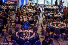 Blue and white Indian wedding reception table setup. Blue and white Indian wedding reception table setup.