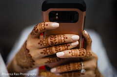 A mirror picture of the Maharani's henna stained hands. A mirror picture of the Maharani's henna stained hands.