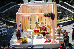 Maharani and Raja sitting of their hindu wedding altar. Maharani and Raja sitting of their hindu wedding altar.
