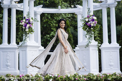 Maharani displaying a beige gown. Maharani displaying a beige gown.