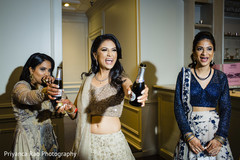Indian bride and bridesmaids having a drink. Indian bride and bridesmaids having a drink.