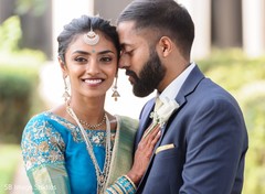 Indian couple holding each other close Indian couple holding each other close