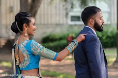 Maharani touching her Indian groom's back. Maharani touching her Indian groom's back.