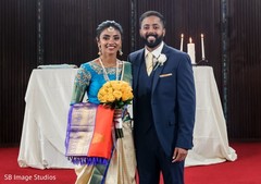 Indian groom with Maharani in front of the altar. Indian groom with Maharani in front of the altar.