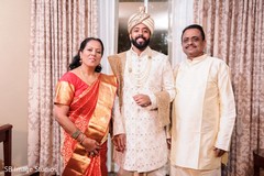 Indian groom with his parents. Indian groom with his parents.