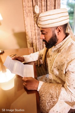 Indian groom reading his Maharani's letter. Indian groom reading his Maharani's letter.