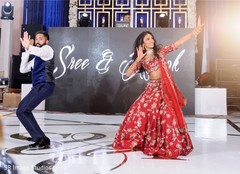 Indian couple performing during reception. Indian couple performing during reception.