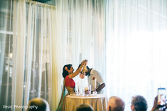 Maharani placing a necklace to her Indian groom Maharani placing a necklace to her Indian groom