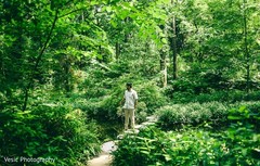 Indian groom walking through the forest Indian groom walking through the forest