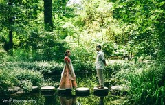Indian couple staring at each other at the forest beck Indian couple staring at each other at the forest beck