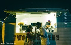 Indian bride feeding her Indian groom Indian bride feeding her Indian groom