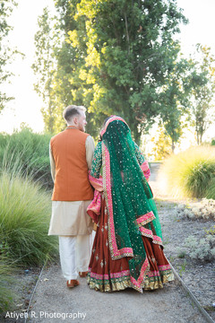 Maharani and her groom walking holding each other. Maharani and her groom walking holding each other.