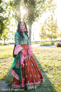 Maharani wearing a green and brown lehenga . Maharani wearing a green and brown lehenga .