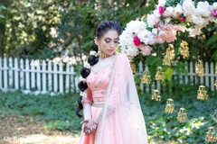 Maharani wearing the baby pink saree during the photo session. Maharani wearing the baby pink saree during the photo session.