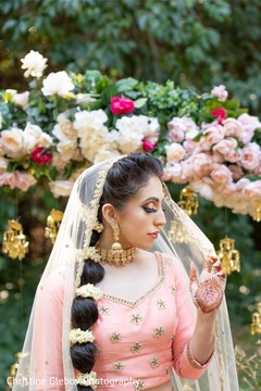 Maharani posing with the Ghoonghat and the bridal saree. Maharani posing with the Ghoonghat and the bridal saree.