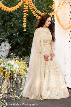 Indian bride posing with reception gown lengha. Indian bride posing with reception gown lengha.