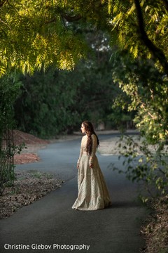 Indian bride outside during the stylized photoshoot. Indian bride outside during the stylized photoshoot.