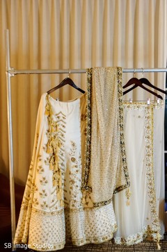 Indian bridal white and golden ceremony outfit. Indian bridal white and golden ceremony outfit.