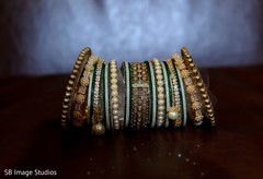 Green, golden and pearls on maharani's chooras. Green, golden and pearls on maharani's chooras.