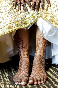 Maharani showing her feet henna art. Maharani showing her feet henna art.